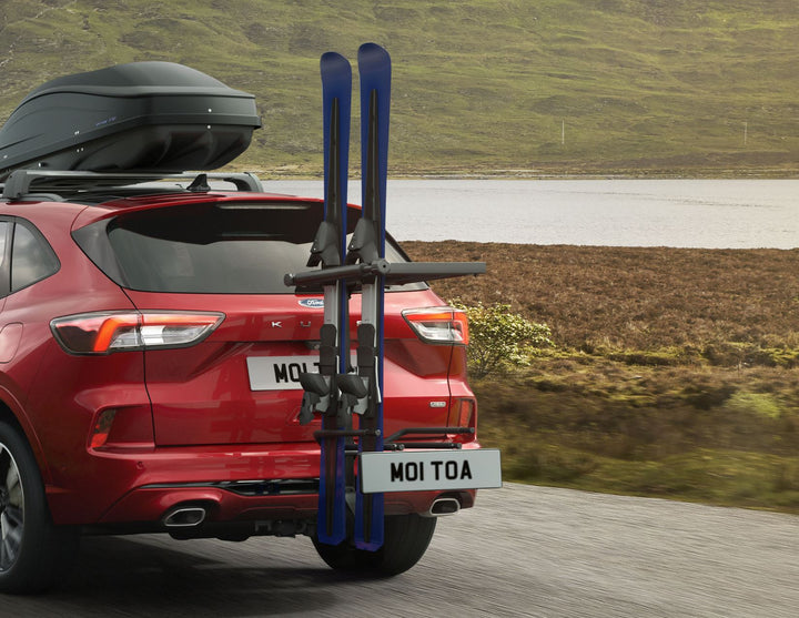 Porte-skis et snowboards sur attelage Mottez