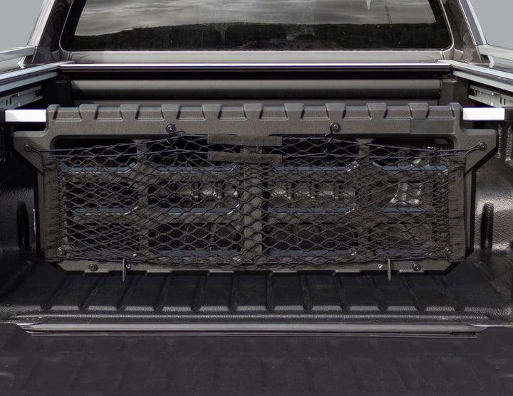 Ford Ranger® Pickup Attitude* Cloison de séparation de benne pour système à glissières en C monté d’origine