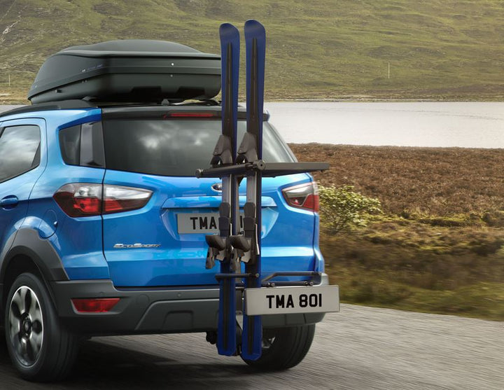 Porte-skis et snowboards sur attelage Mottez