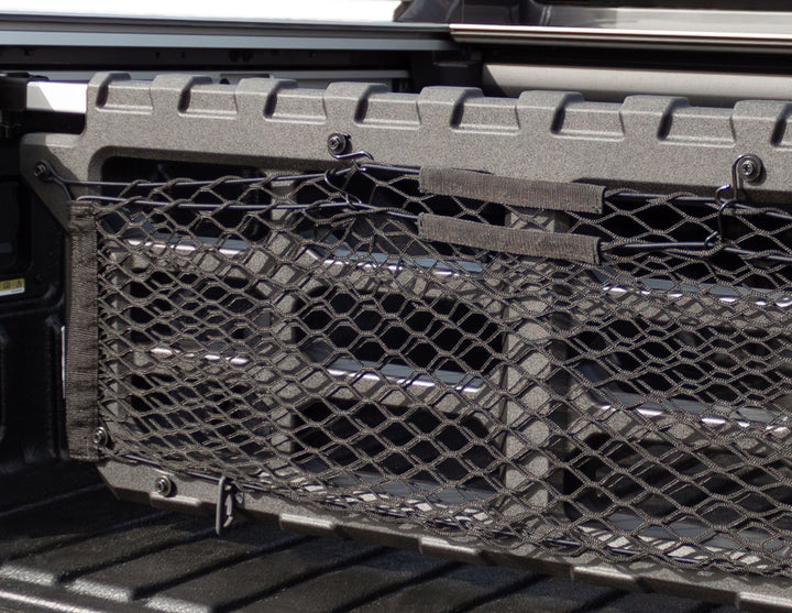 Ford Ranger® Pickup Attitude* Cloison de séparation de benne pour système à glissières en C monté d’origine